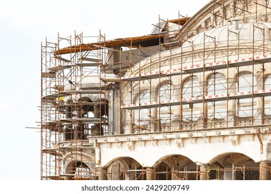 Reconstruction of an ancient building using scaffolding. - Powered by Shutterstock