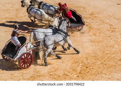 Reconstruction, in arenas, of a Roman chariot race.