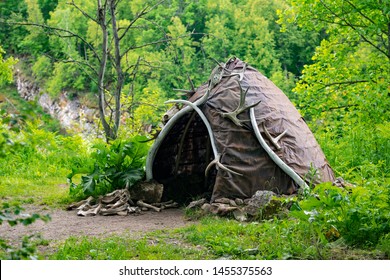 Reconstruction of the human dwelling of the Stone Bronze Age. household items. archaeological excavations concept