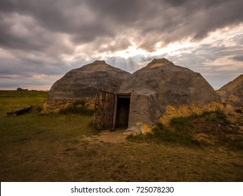 Reconstruction Of The Stone / Bronze Age Home. Archaeological Monument.