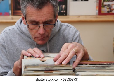 Record Collector Looking Through Vinyl 7