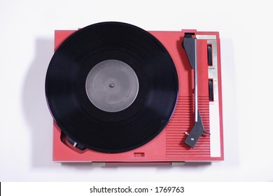 A Record On An Old Red Retro Record Player