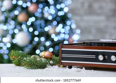 Record Player And Christmas Decor On Table