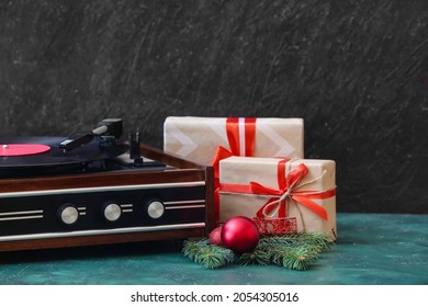 Record Player And Christmas Decor On Table