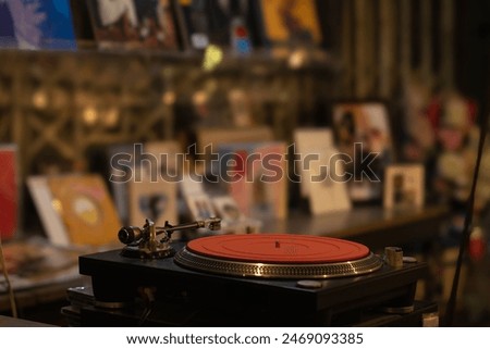 Record player and old records in the background