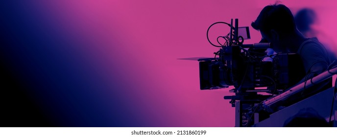 Recording video at studio. Camera records or filming for professional bloggers. Behind the scenes of filming video production. film crew on the set in film studio. Backstage video production recording - Shutterstock ID 2131860199
