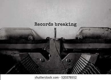 Records Breaking Typed Words On A Vintage Typewriter.