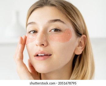 Recovery Pads. Under Eye Mask. Facial Cosmetology. Satisfied Woman With Collagen Patches On Clear Radiant Face Skin On Light Background.