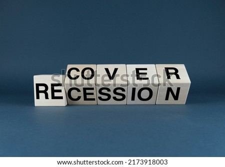 Recovery or recession. The cubes form the words Recover or Recession. A broad concept in both business and medicine