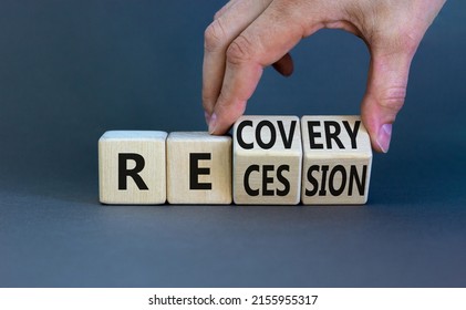 Recovery and recession symbol. Businessman hand turns cubes and changes the word 'recession' to 'recovery'. Beautiful grey background. Business and recovery - recession concept. Copy space. - Shutterstock ID 2155955317