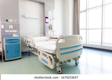 Recovery Room With Beds And Comfortable Medical. Interior Of An Empty Hospital Room. Clean And Empty Room With A Bed In The New Medical Center