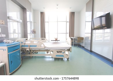 Recovery Room With Beds And Comfortable Medical. Interior Of An Empty Hospital Room. Clean And Empty Room With A Bed In The New Medical Center