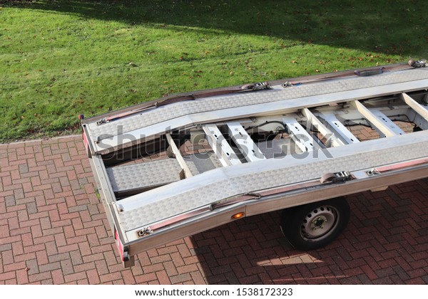 Recovery vehicle ramps for loading cars  and
winch pulls for
loading