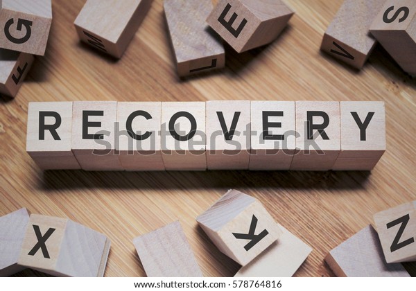 Recovery Word Written In\
Wooden Cube