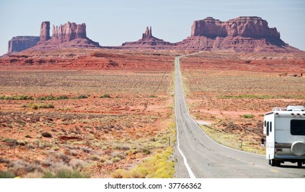 Recreational Vehicle Entering Monument Valley, Utah Usa America. Camper-van Camper Van  Rv Travel Highway Road Usa