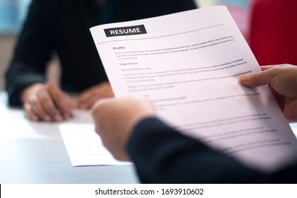 Recruitment, contract and business  employment concept. HR review the profile resume of the job applicant. Business employment and human resource management concept.
