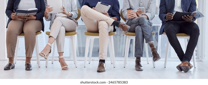 Recruitment, people and queue in waiting room for job interview, hiring or legs on chair in line. Group, lobby or scroll phone or tech in human resource office with resume, info and opportunity