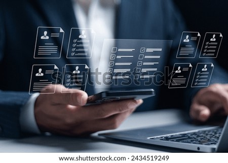 Recruitment process to work efficiently and achieve sustainable business success, team building. Businessman checking cv resume on virtual screen. human resources management concept.