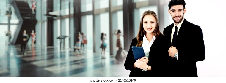 Recruitment and reception occupation concept with blur background, businessman and working woman banner in workplace, hotel, Inn, office and information. - Shutterstock ID 2146510149