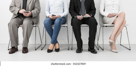 recruitment recruiting hire recruit hiring recruiter interview employment job human room stress stressful position young group formal work chair corporation corporate sitting concept - stock image - Shutterstock ID 552327859