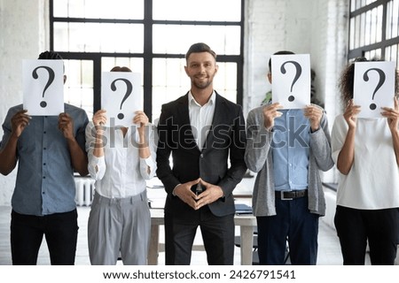 Recruitment selection process. The most competent and motivated candidate with unique skills, getting job in modern company, smiling and looking at camera, among other, less successful job seekers