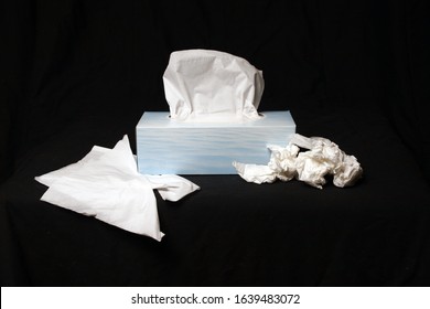 rectangle blue box of tissues on black background
