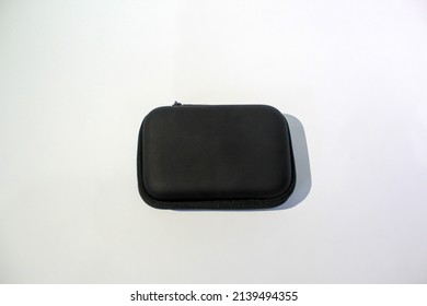 Rectangle holder case for charger and earphone.