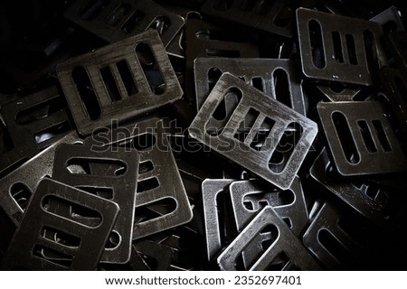 Rectangle steel details with cutoffs pile as background