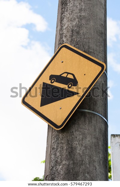 Rectangle yellow car sign\
fixed on pole