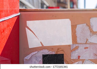 Rectangular blank sticker mockup on the street glued to the road sign. White textured label template.