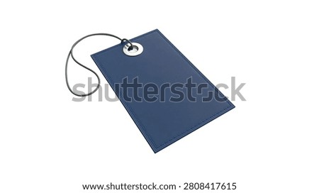 Rectangular blue paper price tag with metal eyelet and grey string loop