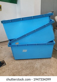 Rectangular Blue Plastic Tanks. Indoor Fish Hatchery Equipment. 3 Units Stacking Each Other.