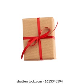 rectangular box wrapped in brown paper and tied with a red bow, gift isolated on white background, template for designer,  great design for any purposes