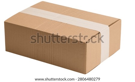 Rectangular brown cardboard shipping box sealed with white adhesive tape