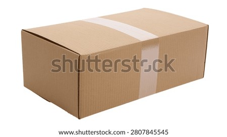 Rectangular brown cardboard shipping box sealed with white adhesive tape