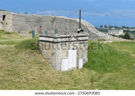 Rectangular building within the walls of Tsar Samuel's Fortress of Ohrid, North Macedonia during a sunny day of spring.