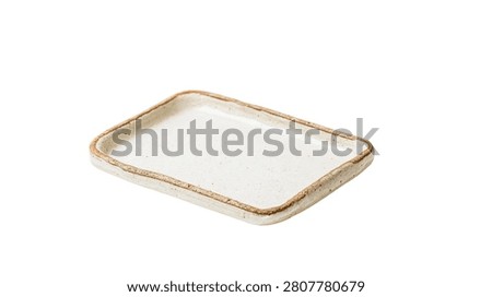 Rectangular handmade ceramic tray with speckled white glaze and rustic brown rim