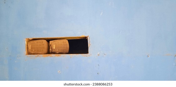 rectangular hole in the blue wall