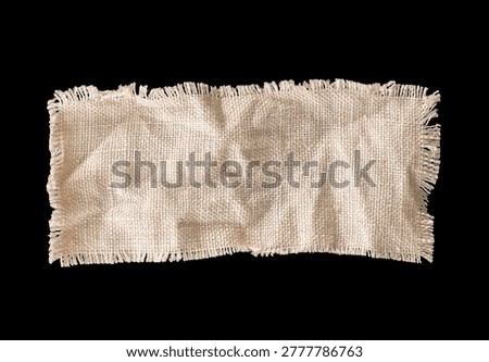 Rectangular linen fabric swatch with slight wrinkles and frayed edges isolated on black background. Natural textile sample ideal for material mockup, sewing, craft, or design projects