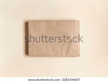 rectangular package in kraft wrapping paper top view
