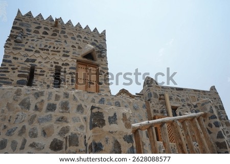 A rectangular parallelepiped tower house made of stone in the old village of Najd Al Miqsar. Najd Al Miqsar is a historical abandoned settlement west of Khor Fakkan in Sharjah, UAE.