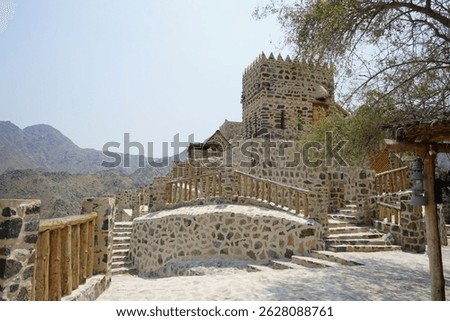 A rectangular parallelepiped tower house made of stone in the old village of Najd Al Miqsar. Najd Al Miqsar is a historical abandoned settlement west of Khor Fakkan in Sharjah, UAE.