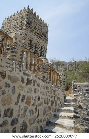 A rectangular parallelepiped tower house made of stone in the old village of Najd Al Miqsar. Najd Al Miqsar is a historical abandoned settlement west of Khor Fakkan in Sharjah, UAE.