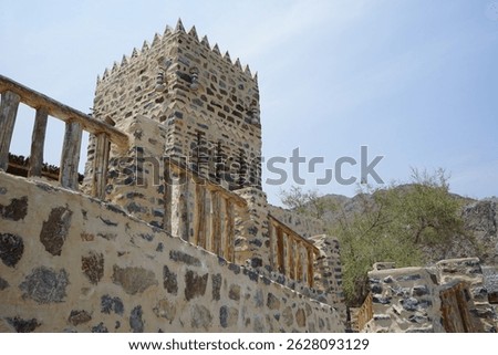 A rectangular parallelepiped tower house made of stone in the old village of Najd Al Miqsar. Najd Al Miqsar is a historical abandoned settlement west of Khor Fakkan in Sharjah, UAE.