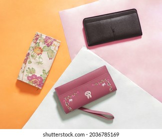 Rectangular Purse With An Elegant Motif. Wallet To Store Money And Cards. Simple And Practical Design To Take Anywhere. Women's Wallet. Wallet Mockup. Focus Blur. Free Space For Your Ad.