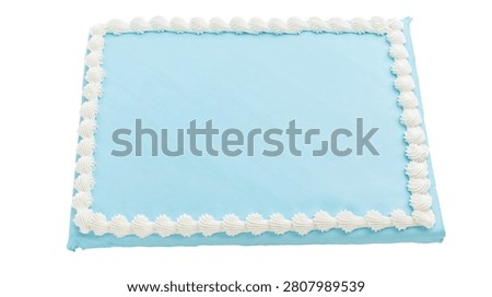 Rectangular sheet cake with light blue frosting and white piped icing border
