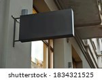 Rectangular sign on the building. Copy space and space for text. Mockup for design. Blank template for advertising.