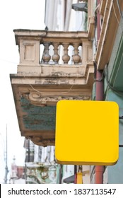 Rectangular sign on the building. Copy space and space for text. Mockup for design. Blank template for advertising.