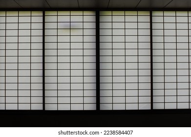 Rectangular and square Japanese shoji paper window frame with partitions with light in Japan - Shutterstock ID 2238584407