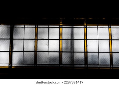 Rectangular stained glass in the ceiling. Decorated stained glass window.